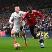 Adam Forshaw and Paul Pogba vie for the ball at Elland Road. Pic: Laurence Griffiths.