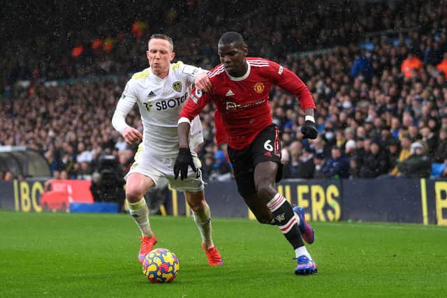 Adam Forshaw and Paul Pogba vie for the ball at Elland Road. Pic: Laurence Griffiths.