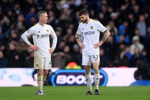 Adam Forshaw and Mateusz Klich at the final whistle. Pic: Laurence Griffiths.
