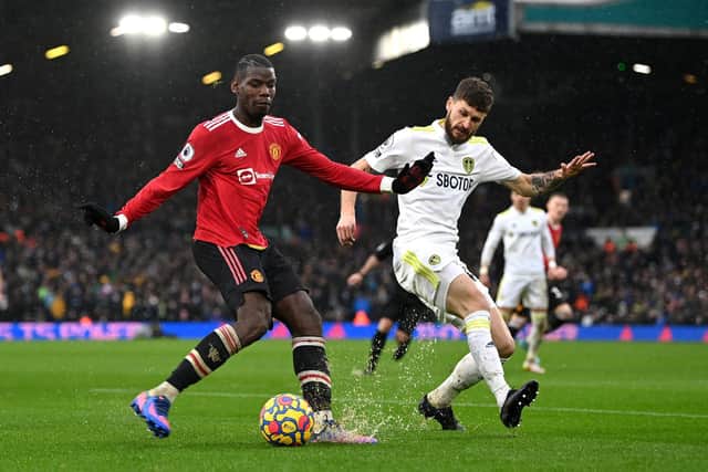 Mateusz Klich goes to block Paul Pogba at Elland Road. Pic: Shaun Boterill.