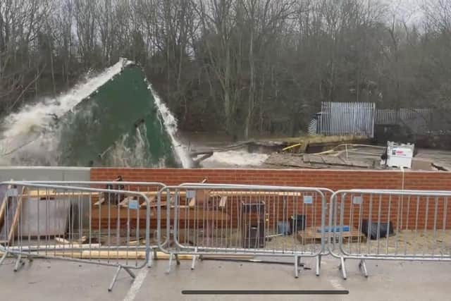 It shows a pontoon used to carry out flood defence work crashing into the footbridge. Picture: Andrew Tutin/The Climbing Lab.