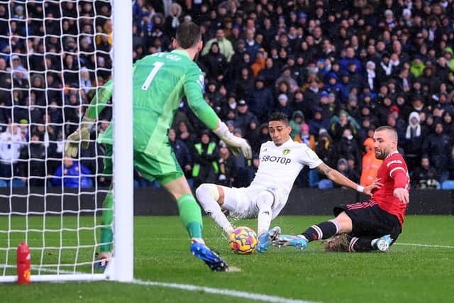 Raphinha scores Leeds United's equaliser. Pic: Laurence Griffiths.