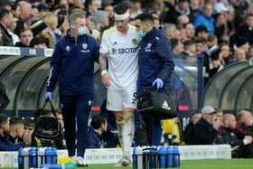 BIG BLOW - Leeds United defender Robin Koch went off, looking dizzy, after taking a bang to the head from Manchester United's Scott McTominay. Marcelo Bielsa said he was withdrawn because of a cut to the head. Pic: Simon Hulme