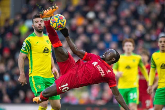 Sadio Mané scores Liverpool's first goal against Norwich City at Anfield on Saturday. Pic: Joe Prior.