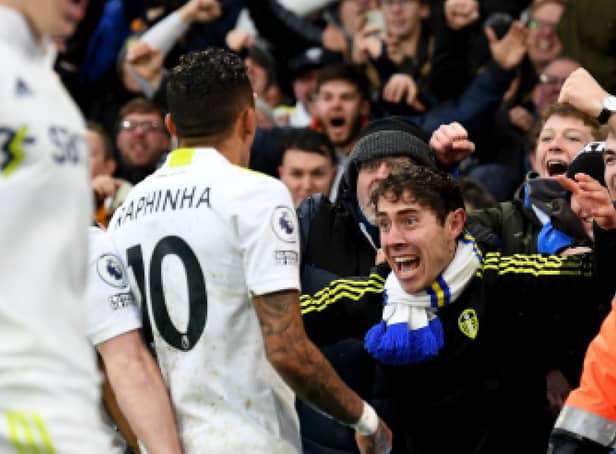 Raphinha celebrates scoring Leeds United's equaliser with the fans at Elland Road. Pic: Simon Hulme.