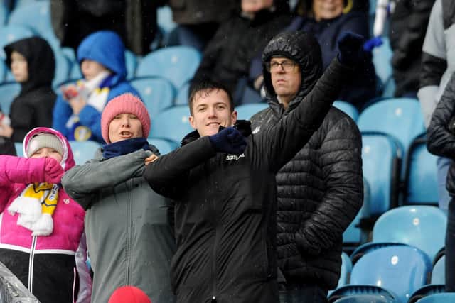 Fans salute ahead of kick off.