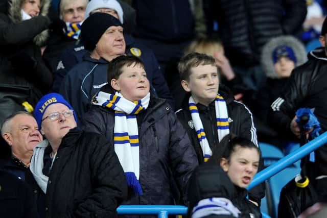 Young fans take in the view at Elland Road.