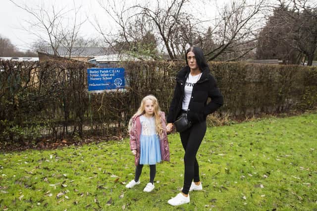 Talor Hartshorne, pictured with five-year-old daughter Maisie outside Batley Parish J, I & N School. Picture: Jim Fitton.