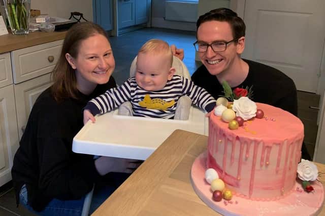 Nichola and Greg celebrating baby Oscar's first birthday - and the completion of Nichola's 310,000 steps challenge.