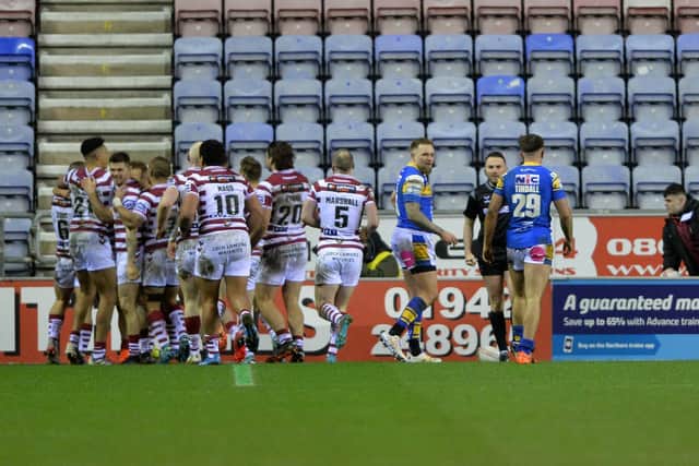 Wigan Warriors' Jai Field celebrates scoring his side's fourth try against Leeds Rhinos. Picture: Bruce Rollinson.