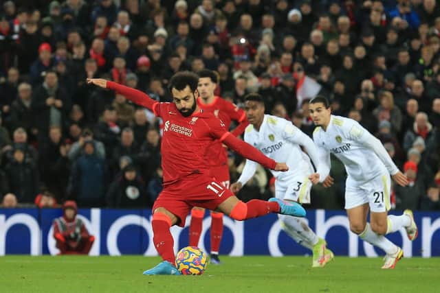 Mohammed Salah strikes the penalty to put Liverpool 1-0 ahead. Pic: Lindsey Parnaby.