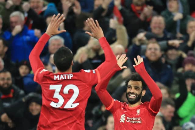 Joel Matip celebrates scoring Liverpool's second goal with Mo Salah. Pic: Lindsey Parnaby.