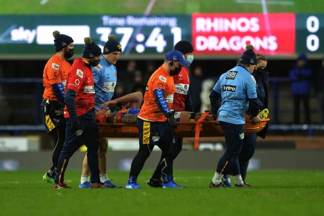Alex Mellor was taken off the field on a stretcher just minutes into Rhinos' defeat by Catalans. Picture by Jonathan Gawthorpe.