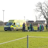 A Sunday league footballer has praised an opposition player who helped save his life after a clash of heads left him with a severely fractured skull. The ambulance at the site of the accident, Wiggington Sports Club, York.