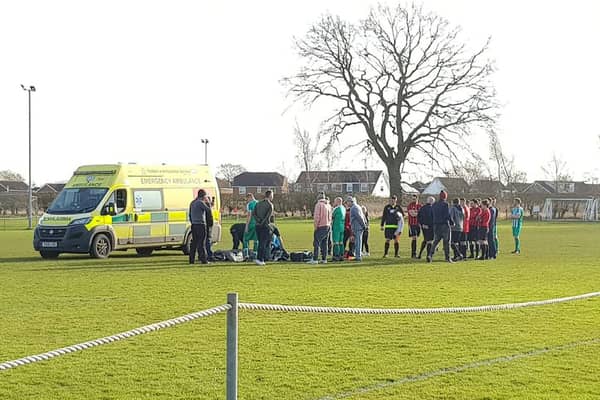 A Sunday league footballer has praised an opposition player who helped save his life after a clash of heads left him with a severely fractured skull. The ambulance at the site of the accident, Wiggington Sports Club, York.