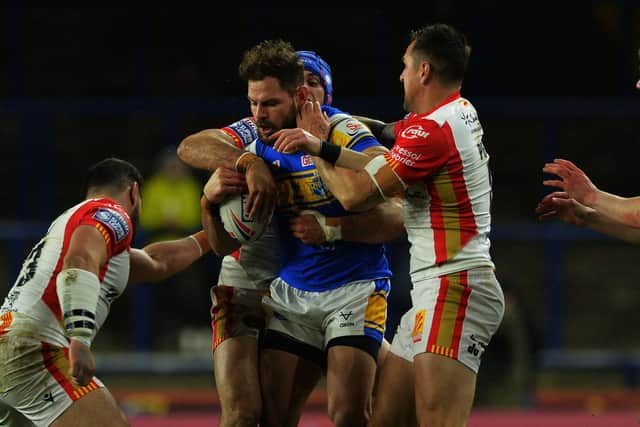 Leeds Rhinos' Aidan Sezer is stopped by the Catalans Dragons defence. 
Picture: Jonathan Gawthorpe.