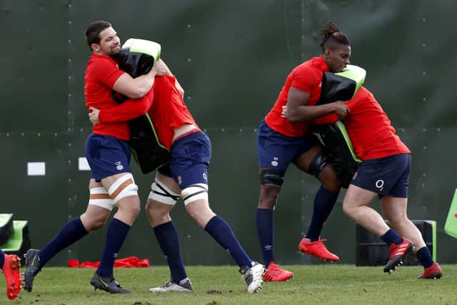 England's Charlie Ewels (left) and Maro Itoje (second right) during a training session at The Lensbury Hotel. Picture: Adrian Dennis/PA