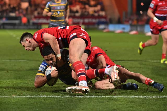 OVER THE LINE: Jordan Turner scores Castleford Tigers' first try against Hull KR   Picture: Bruce Rollinson