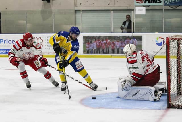 Leeds Knights' Adam Barnes tries to backhand past goalie Renny Marr in the first of two pre-season challenge games against Swindon Wildcats. Picture courtesy of Kat Medcroft - Swindon Wildcats