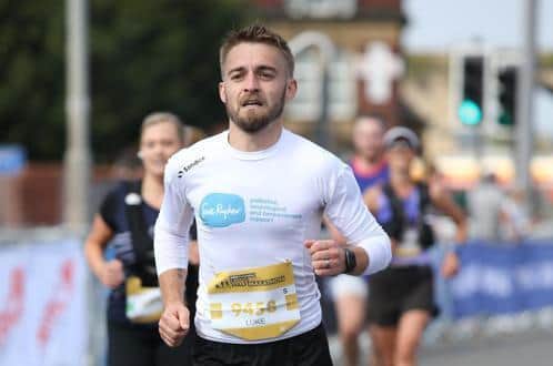 A picture taken of Luke Hayton-Sollitt taking part in the Leeds Half Marathon last year, where he raised £1500 for Sue Ryder Wheatfields.