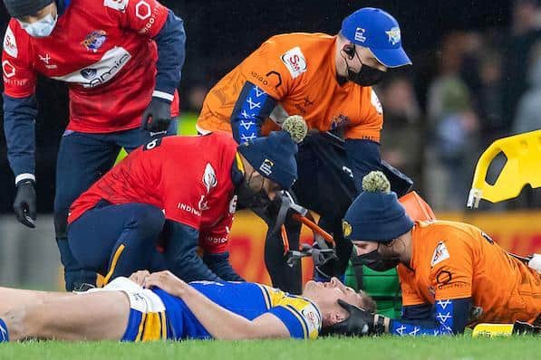 Rhinos' medical staff treat Mellor during last week's game. Picture by Allan McKenzie/SWpix.com.