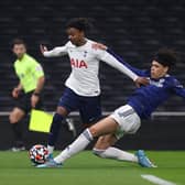 DETERMINED: Leeds United under-23s defender Jeremiah Mullen, right, tackles J'Neil Bennett in Monday night's 1-1 draw against Tottenham Hotspur under-23s. 
 Photo by Alex Morton/Getty Images.
