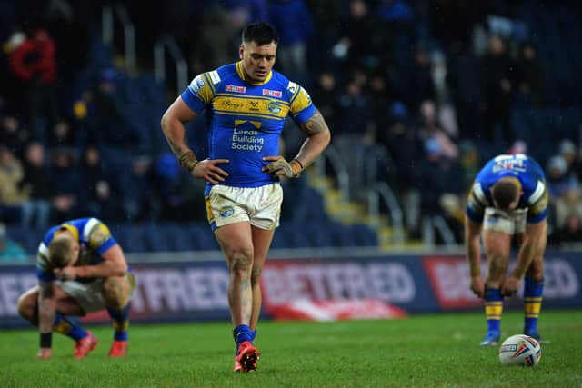 Leeds Rhinos Zane Tetevano and his team-mates show their disappointment after losing to Catalans Dragons  Picture: Jonathan Gawthorpe