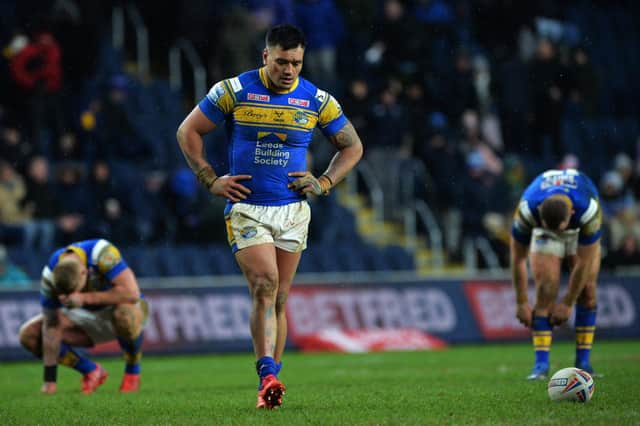 Leeds Rhinos Zane Tetevano and his team-mates show their disappointment after losing to Catalans Dragons  
Picture: Jonathan Gawthorpe