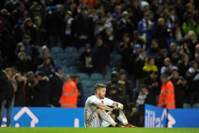 Pontus Jansson looks dejected after two late goals deny Leeds United Championship points in a 4-3 defeat to Millwall at Elland Road. Pic: Tony Johnson.