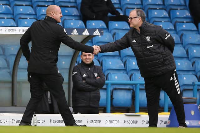 Burnley boss Sean Dyche shakes hands with former Leeds United manager Marcelo Bielsa. Pic: Nigel French.