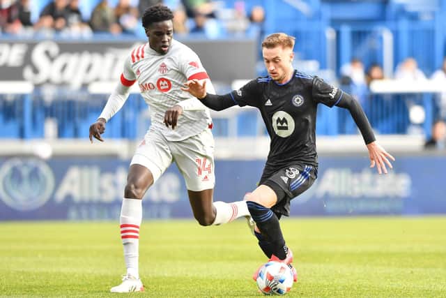 REPORTED INTEREST: From Leeds United in FC Montreal's US international midfielder Djordje Mihailovic, right, pictured challenging Toronto FC's Noble Okello in the 2021 Canadian Championship Final last year. Photo by Minas Panagiotakis/Getty Images.
