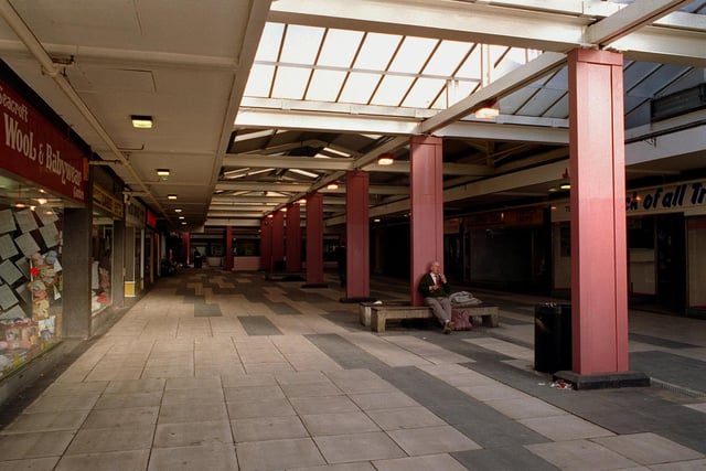 Dark, gloomy and almost deserted arcades in Seacroft Shopping Centre pictured in the mid-1990s.