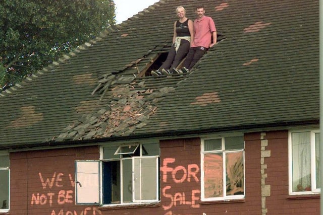 This couple - Mandy Clough and Trevor Smith - took to the roof of their home on Kentmere Avenue in Seacroft to protest over plans to evict them in September 1999.