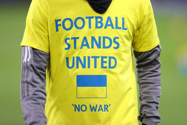 LEAGUE STANCE - Liam Cooper and the other Premier League captains will wear armbands in the Ukrainian colours this weekend as the division rejects the actions of Russia. Pic: Getty