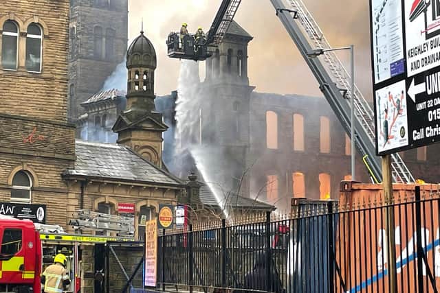 Dramatic photos show the blaze at Dalton Mills in Keighley, West Yorks, which is being tackled by more than 20 fire crews. Picture: Ben Lazenby.