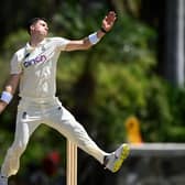 England's Matt Fisher bowling in Antigua. (Photo by Gareth Copley/Getty Images)