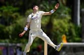 England's Matt Fisher bowling in Antigua. (Photo by Gareth Copley/Getty Images)