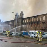 These dramatic photographs taken by fire crews in West Yorkshire reveal the extent of the damage to a historic mills in Keighley.