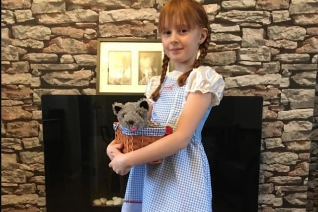 Amy Sellers shared a photo of Mylie-Ma,y age 7, As Dorothy from The Wizard of Oz.