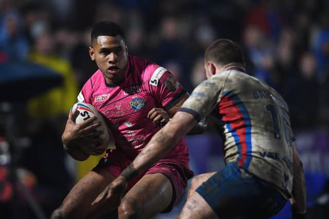 Wakefield Trinity v Leeds Rhinos.
Rhinos David Fusitua takes on Trinity's James Batchelor.
3rd March 2022.
Picture : Jonathan Gawthorpe