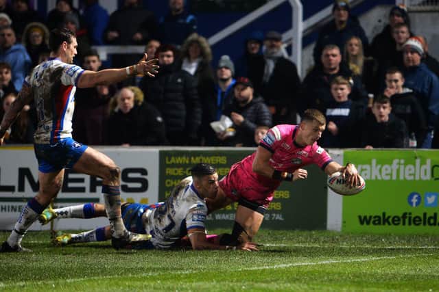 Wakefield Trinity v Leeds Rhinos.
Rhinos Ash Handley scores his first try.
3rd March 2022.
Picture : Jonathan Gawthorpe