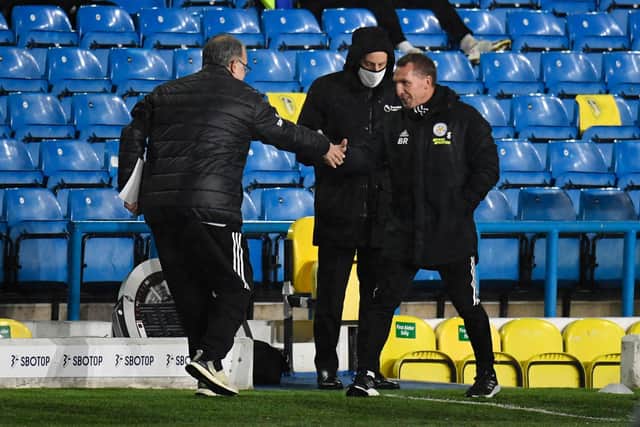 TRIBUTE: From Brendan Rodgers, right, to Marcelo Bielsa, left, the pair pictured shaking hands before Leeds United took on Leicester City at Elland Road in November 2020. Photo by Peter Powell - Pool/Getty Images.