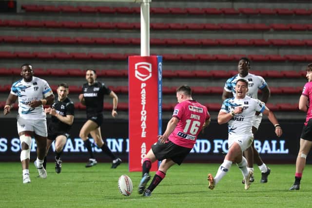 Wigan Warriors' Harry Smith kicks the winning point against Toulouse Olympique Picture by Manuel Blondeau/SWpix.com
