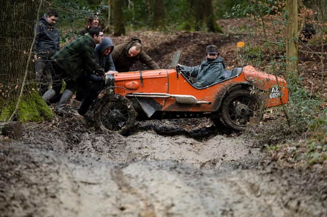 Sarah Skelton gets a push from spectators in her 1930 Austin 7 Ulster as members of the Vintage Sports-Car Club got to grips with the John Harris Trial. Photo Rod Kirkpatrick/F Stop Press