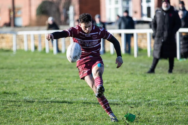 Joel Gibson kicks a goal for Thornhill Trojans. Picture: Bruce Fitzgerald