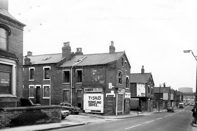 Domestic Street towards the railway viaduct. Houses and shops on Willoughby Avenue in the foreground, then Willoughby Grove, Willoughby Place and other Willoughbys, are all boarded up, due to be demolished.