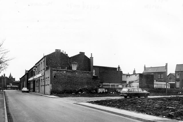 St. Matthew's Street showing the junction with Pleasant Mount in February 1980. The Bull's Head pub can be seen in the centre. In the foreground is an area of land where houses have been demolished.