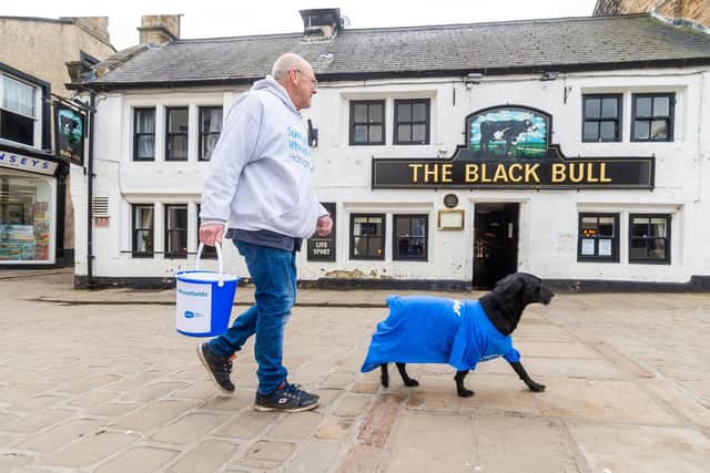 Steve Wilkinson and dog Harley. Picture: James Hardisty