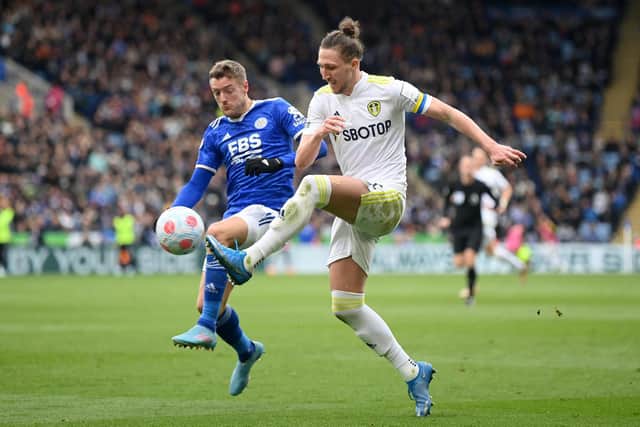 Luke Ayling and Jamie Vardy vie for the ball during Leeds United's 1-0 defeat to Leciester City. Pic: Michael Regan.