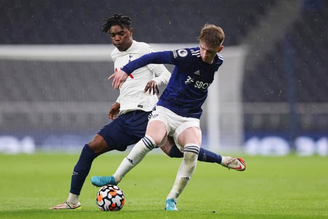 Stuart McKinstry battles Dermi Lusala during Leeds United's 1-1 Premier League 2 Division One draw with Tottenham Hotspur. Pic: Alex Morton.